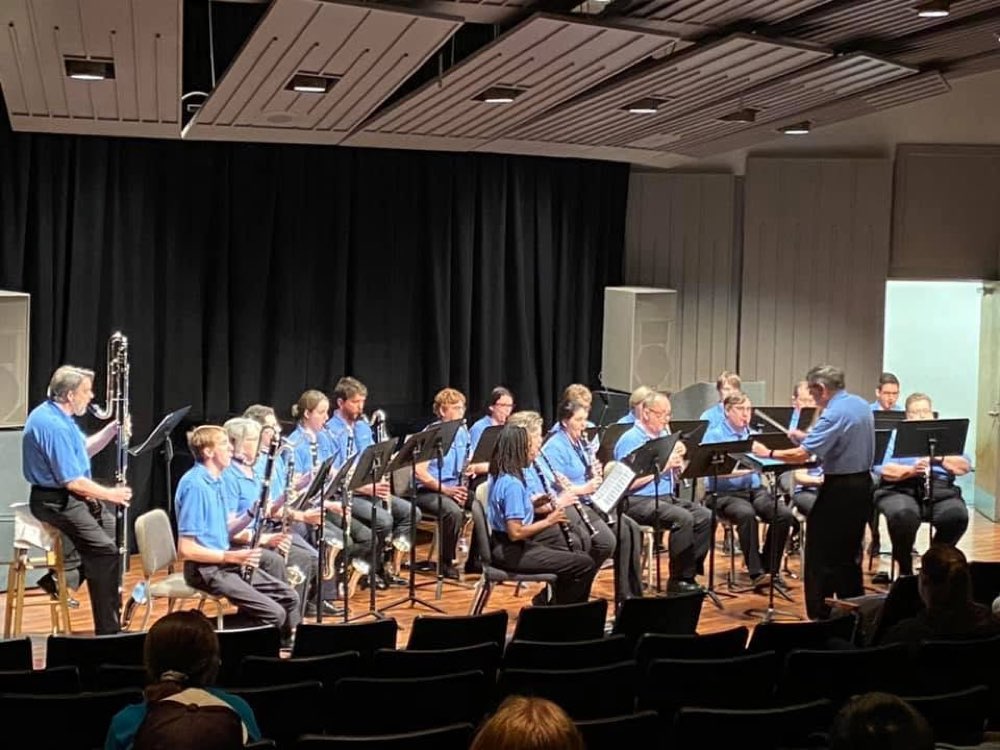 The Clarinet Choir performing in a recital hall to a seated audience